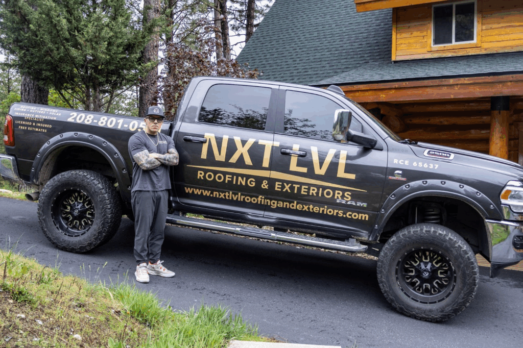 Ricky, Owner of NXT LVL Roofing in front of a branded truck in Boise